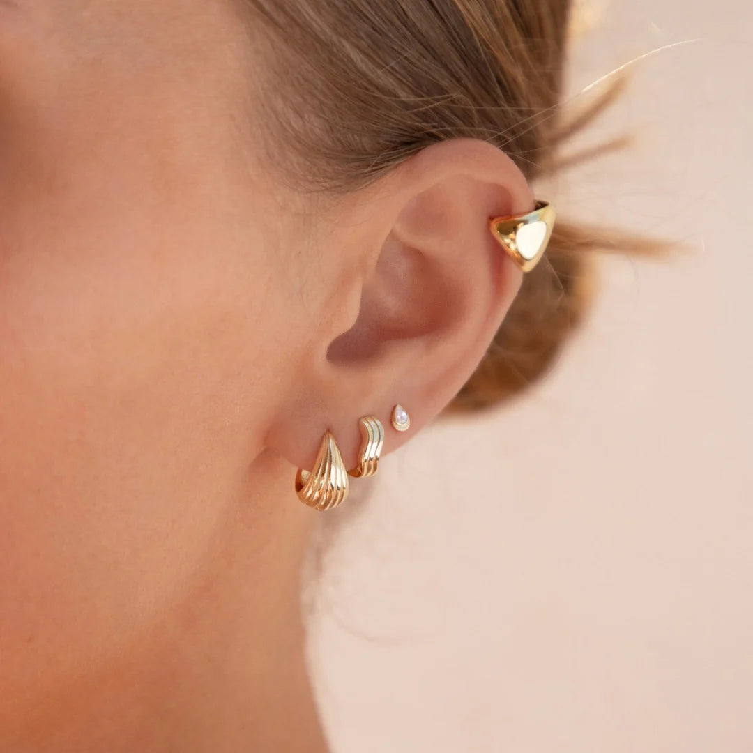 Curvas Yellow Gold Plated Wave Huggie Hoop Earrings