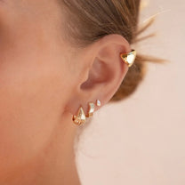 Curvas Yellow Gold Plated Wave Huggie Hoop Earrings