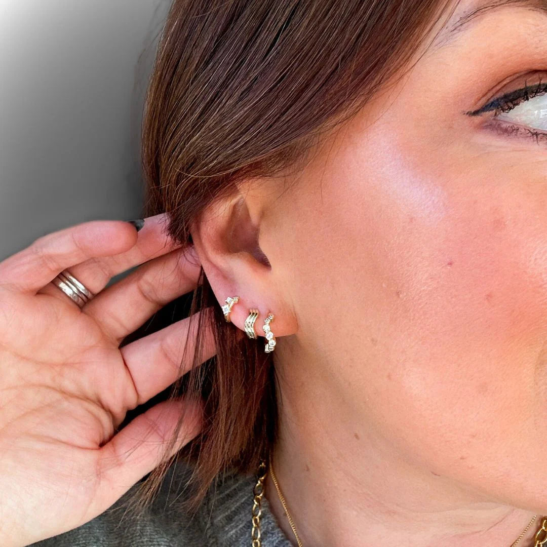 Curvas Yellow Gold Plated Wave Huggie Hoop Earrings