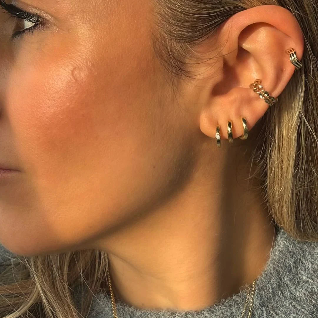 Curvas White Gold Plated Wave Huggie Hoop Earrings