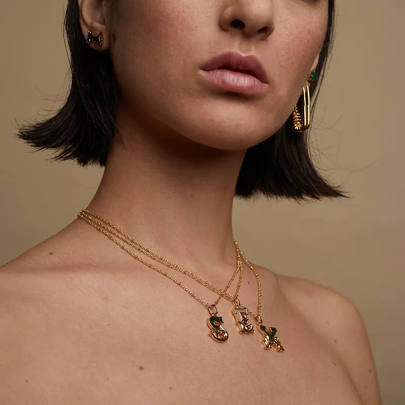 E - Gold Mother of Pearl