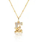 E – Gold with Mother of Pearl