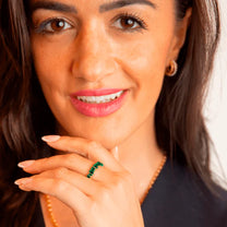 Sparkly Emerald Gold Baguette Eternity Ring